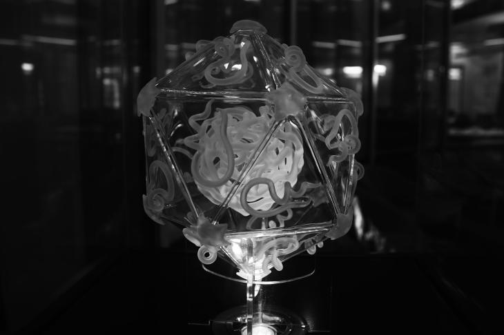A glass model of foot and mouth disease virus in black and white